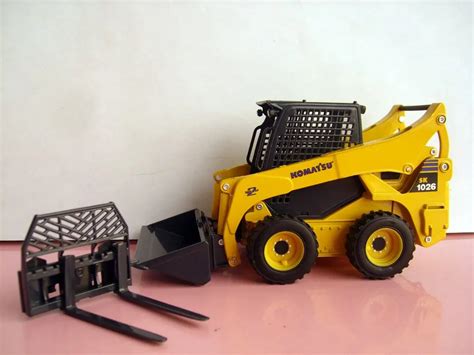 large toy skid steer|toy skid loader with forks.